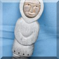 A32. Signed whale tooth figural carving. 